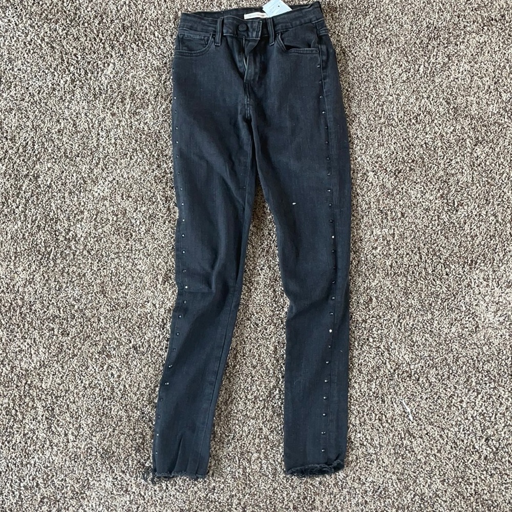 Black Levi’s with studs on the side